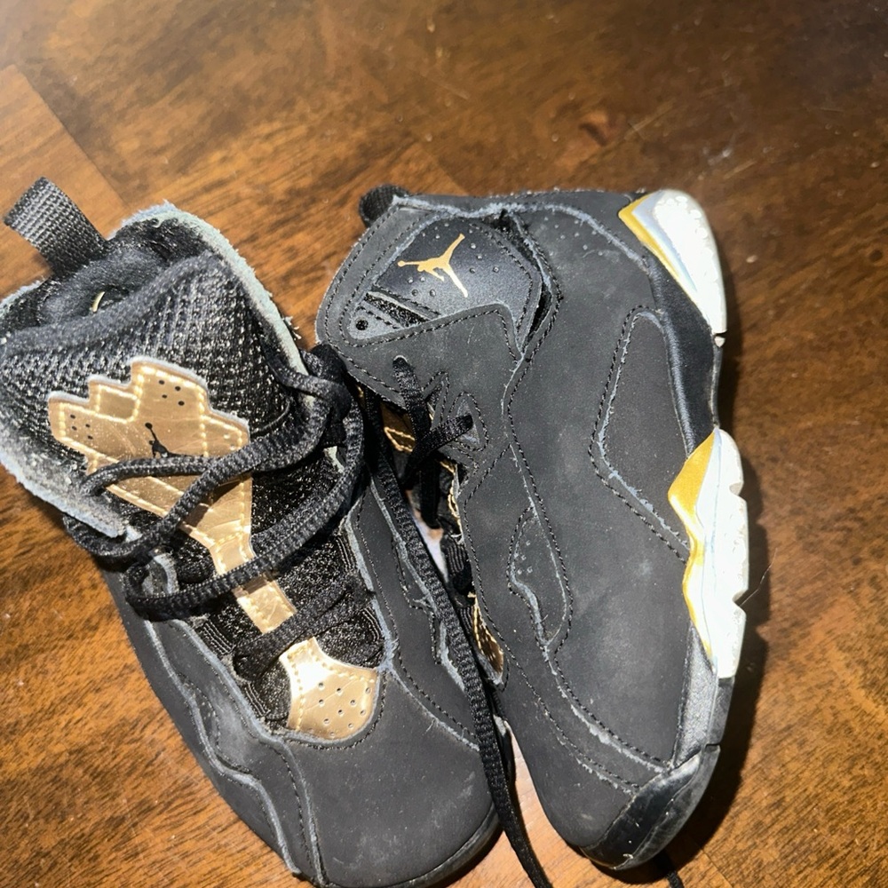 Jordan Kids Black and Gold Sneakers size 8c